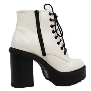 Brand new pair of Soda faux leather combat boots in size 10.  New without tags